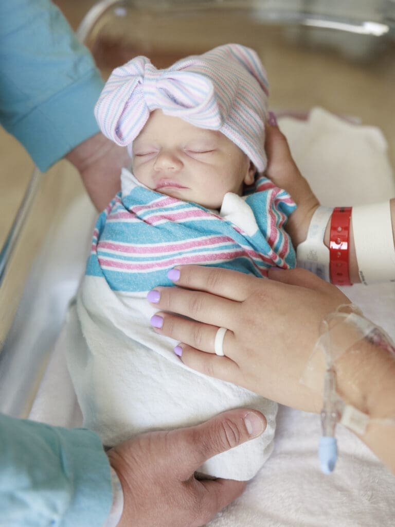 Swaddled baby in hospital First 48 session in Tampa
