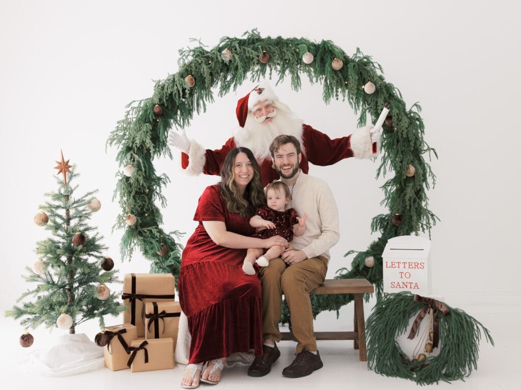 Tampa family in photo with Santa.